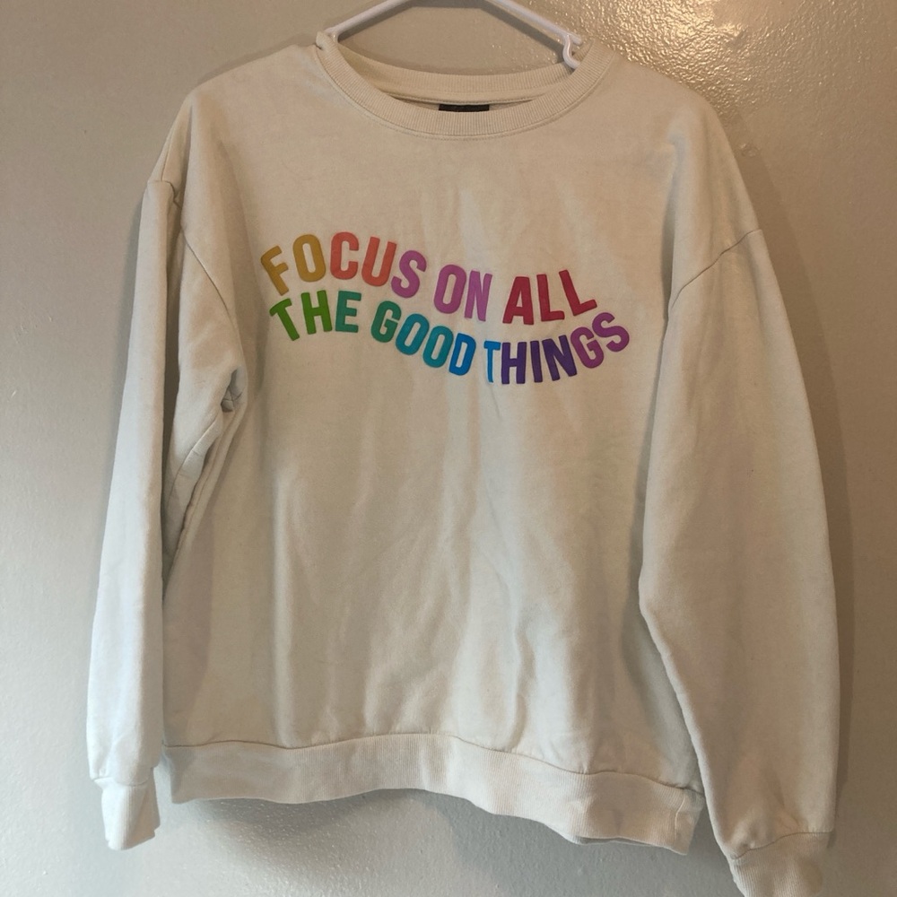 White Sweatshirt with Colorful Text